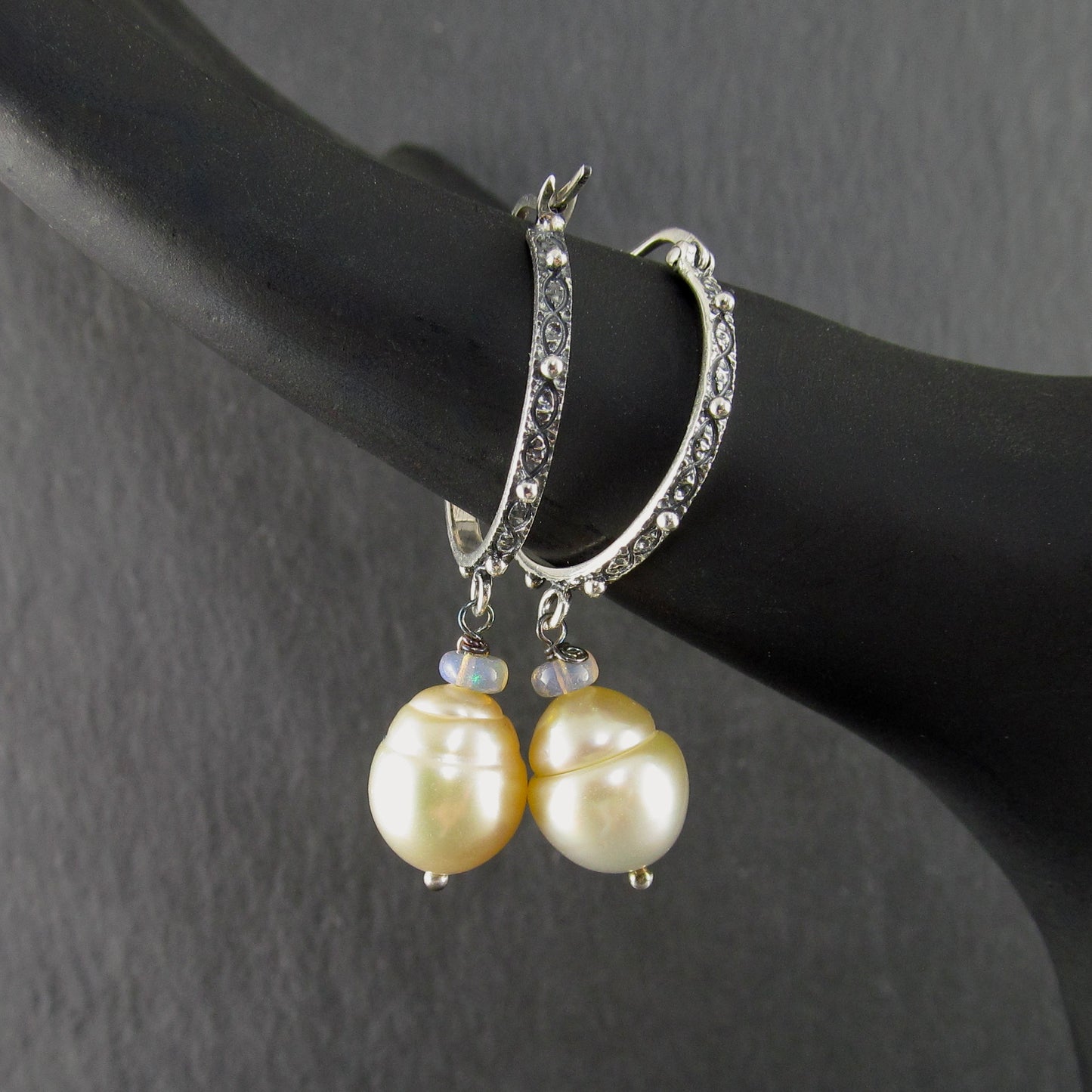 Sterling silver hoop earrings with gold South Sea pearls and Ethiopian opals