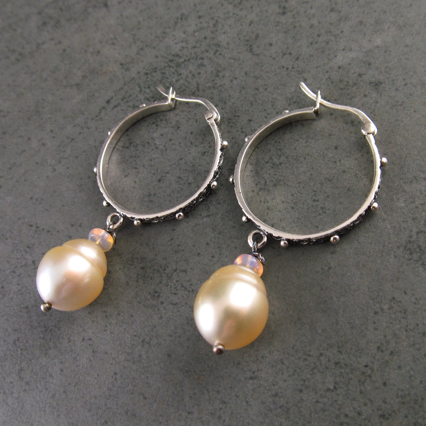 Sterling silver hoop earrings with gold South Sea pearls and Ethiopian opals