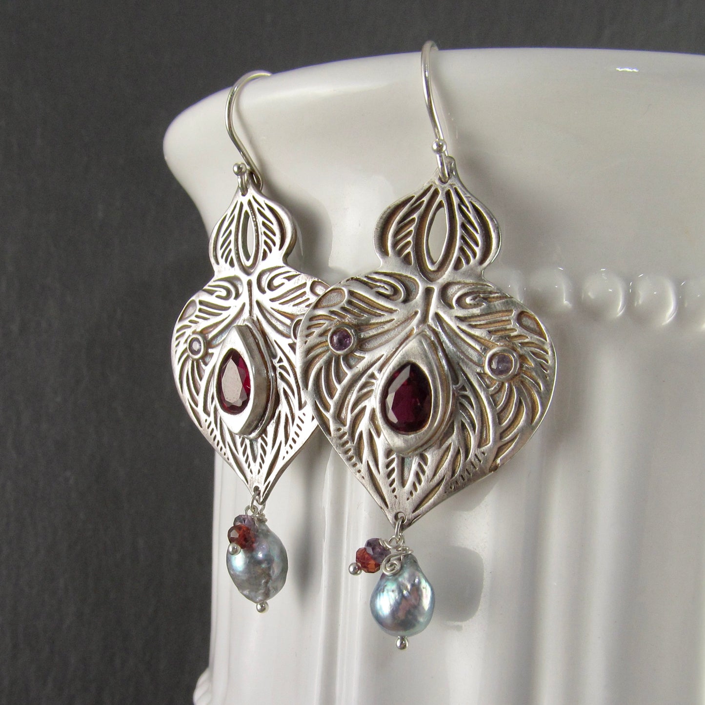 Garnet arabesque earrings with purple sapphire and blue Akoya pearls in recycled fine silver