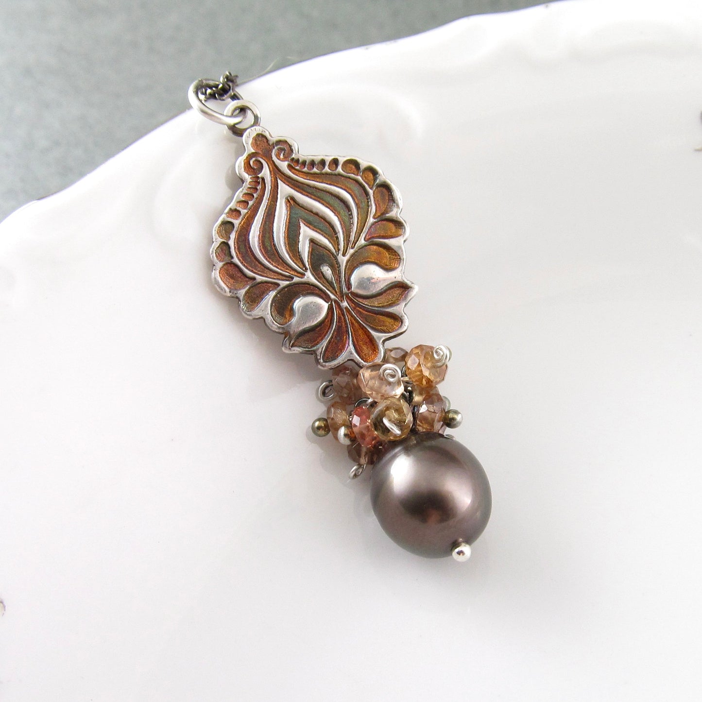 Mocha Tahitian Pearl pendant in fine silver with color change garnets