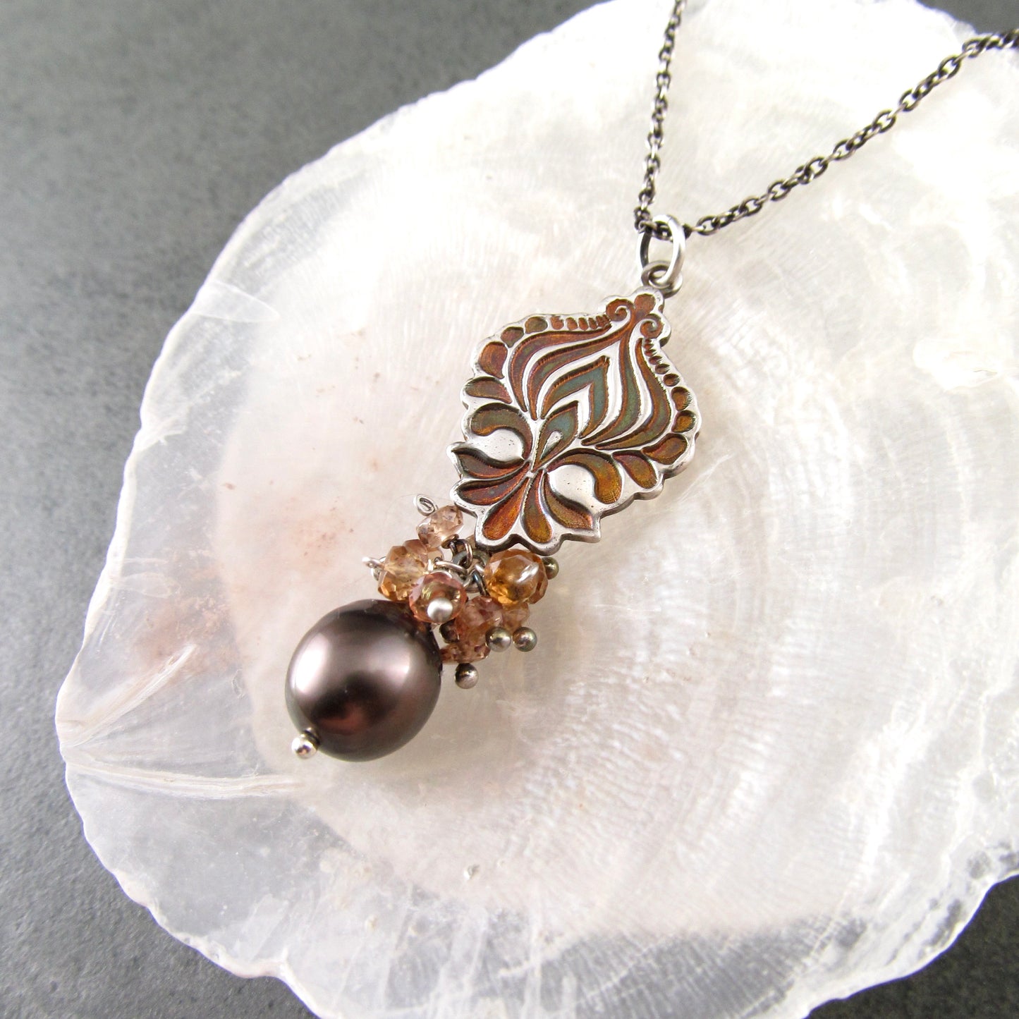 Mocha Tahitian Pearl pendant in fine silver with color change garnets