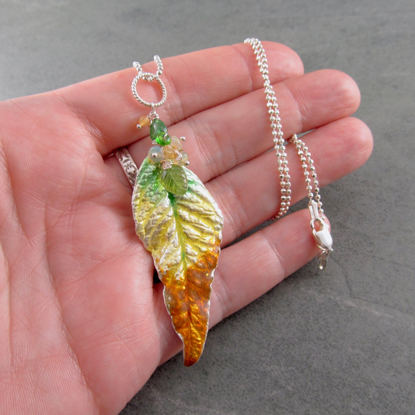 Fall leaf pendant, handmade fine silver and enamel with peridot, tsavorite garnet and Ethiopian opal