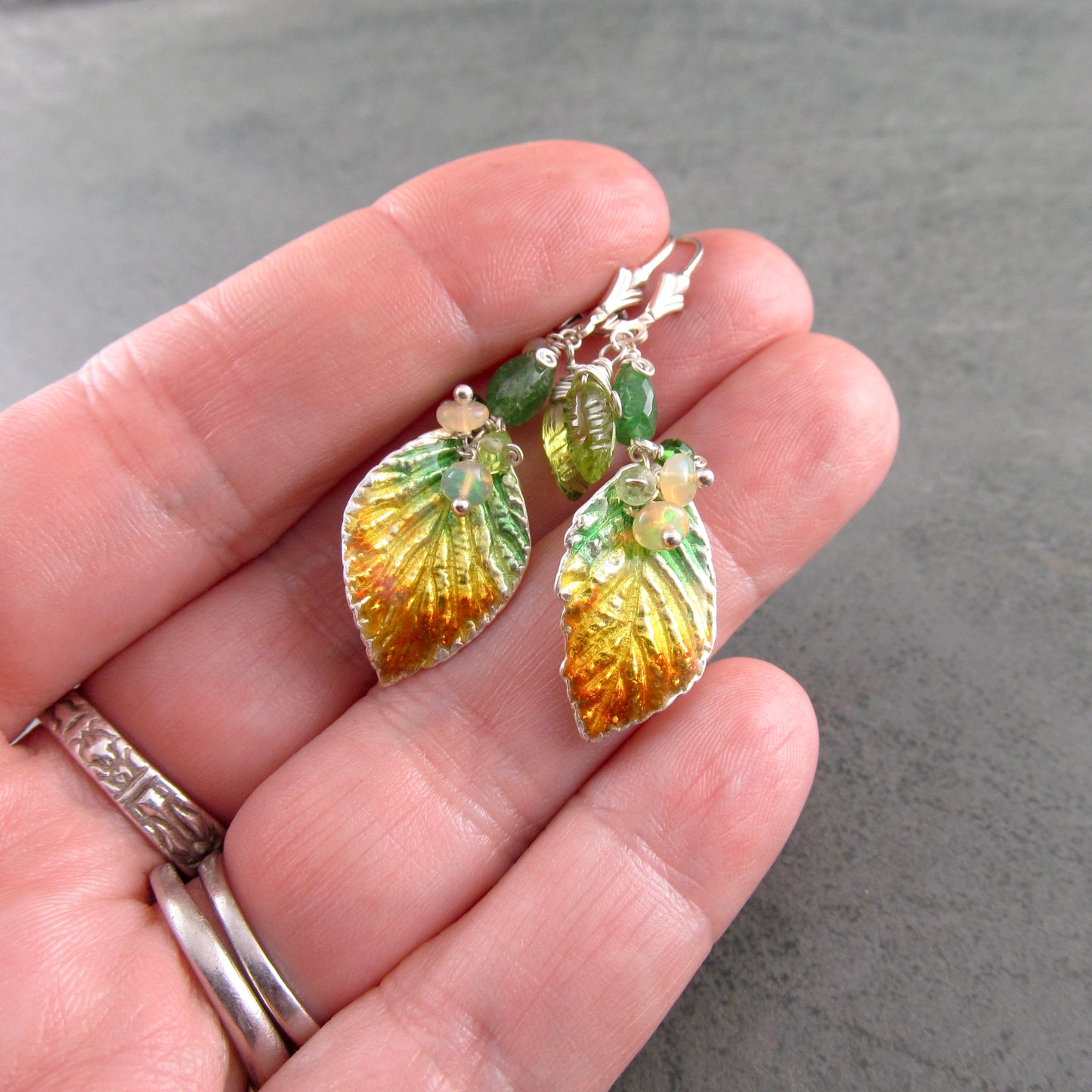 Fall leaf enamel earrings in fine silver with Ethiopian opal, peridot, and tsavorite garnet