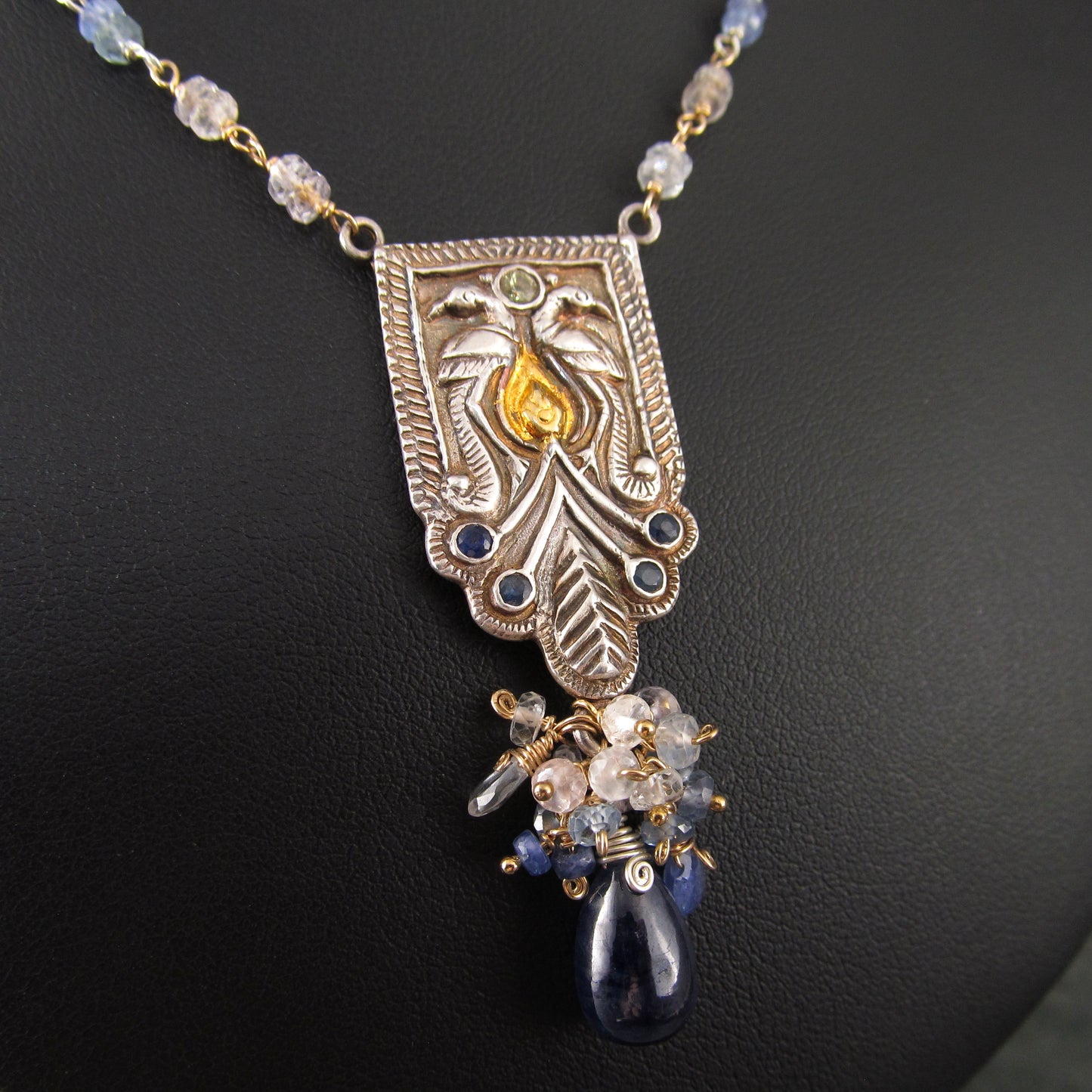 Sapphire peacock necklace in fine silver with 22k gold accents