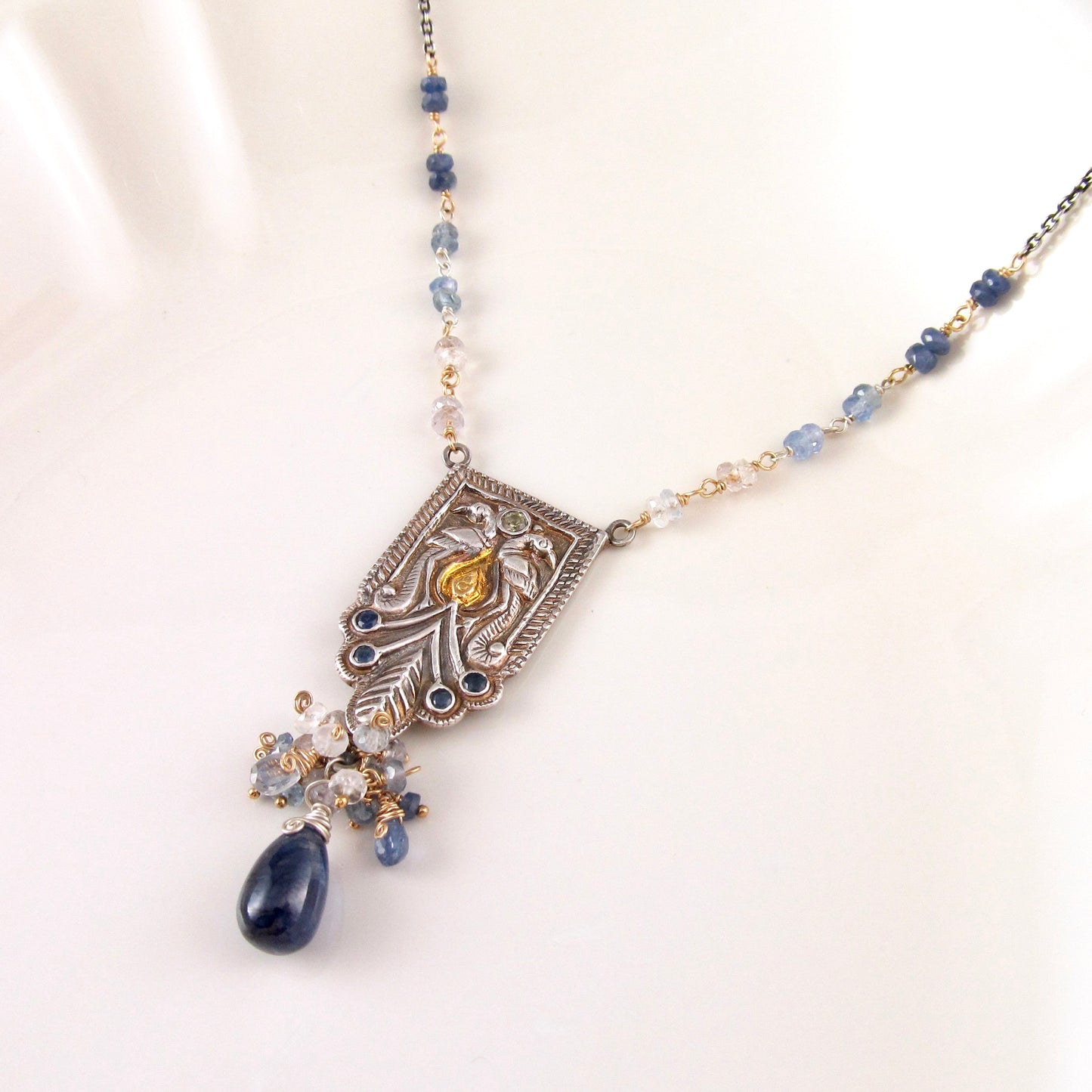 Sapphire peacock necklace in fine silver with 22k gold accents