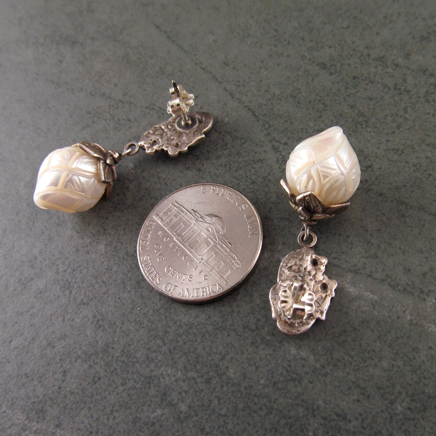 Carved pearl flower bud earrings in fine silver with pastel sapphires